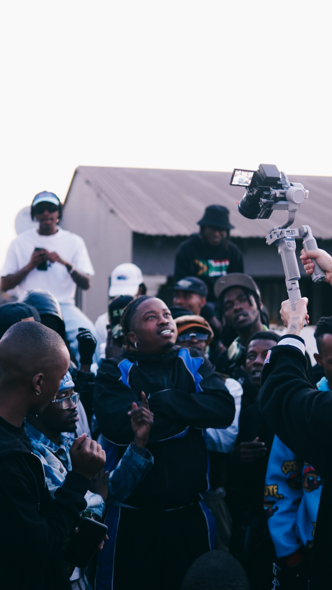 SKIIPS shooting his unreleased track from his upcoming EP, “No Gender Reveal,” in our After Dark Tracksuit.